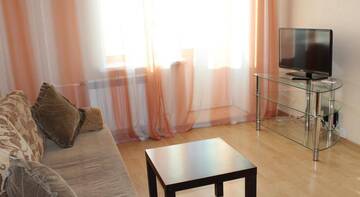 Фото номера Апартаменты с 1 спальней Гостевой дом Apartment na Putilovskoy 20g г. Барнаул 5